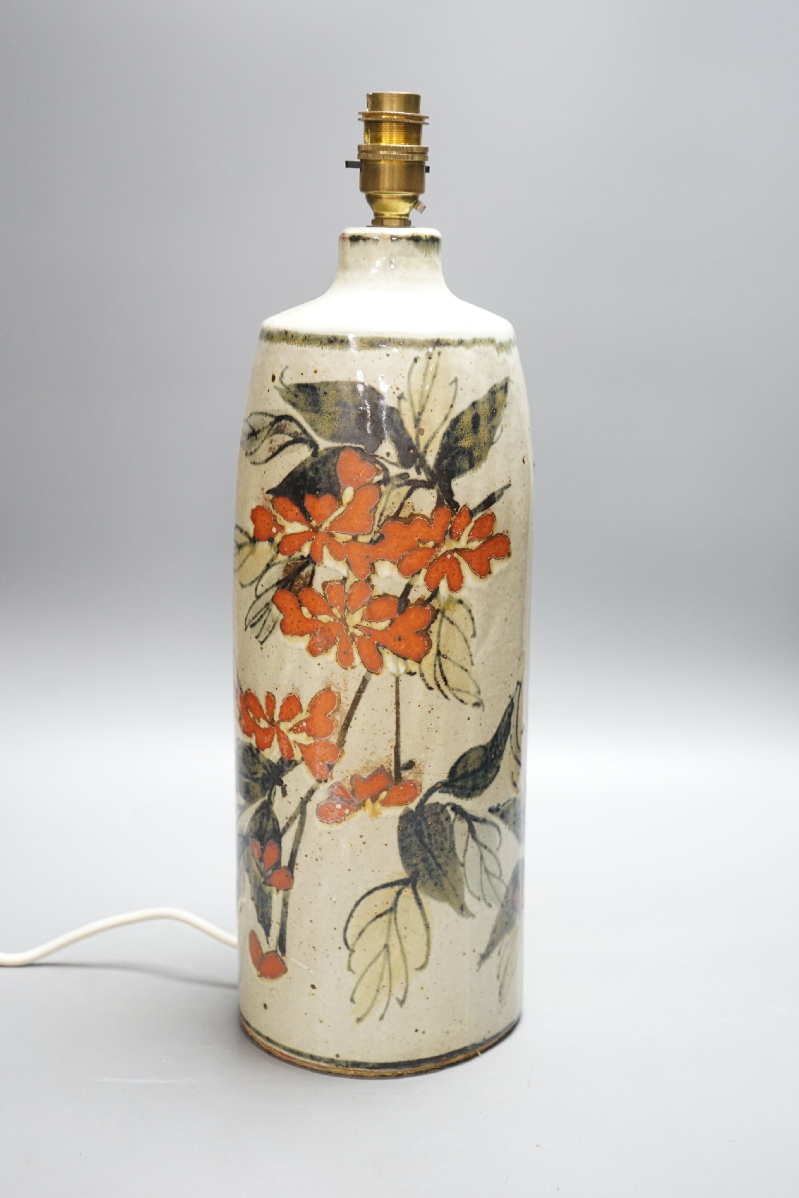 M? A slip decorated stoneware lamp base 38cm